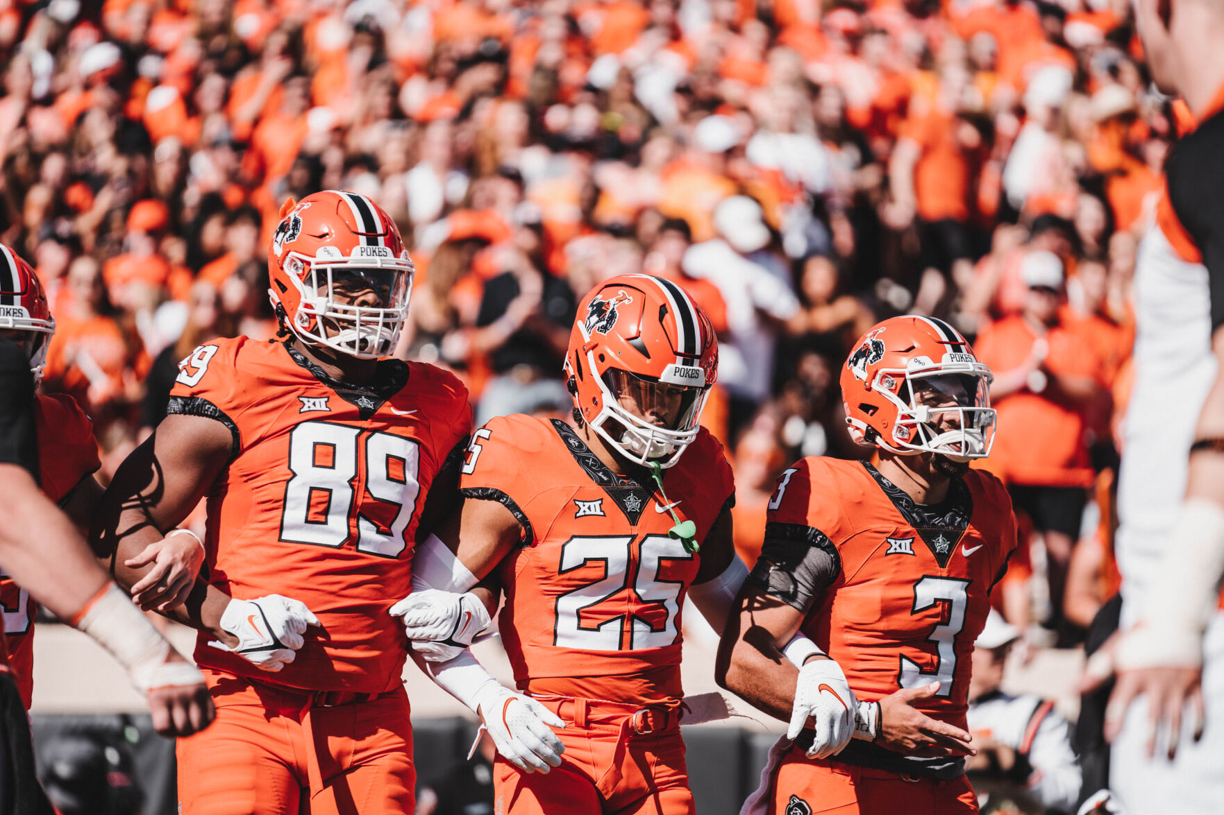 #89 Tyler Lacy, #25 Jason Taylor, #3 Spencer Sanders